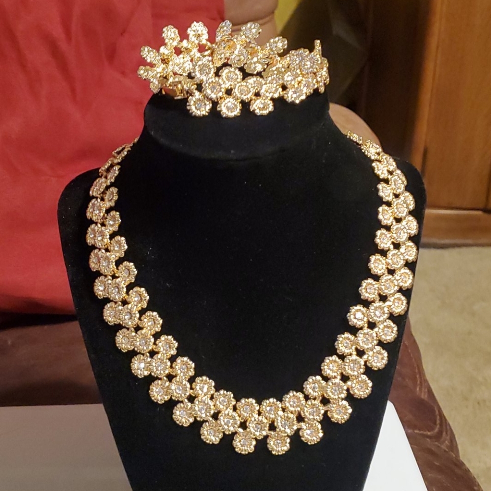Women's gold toned and rhinestone set